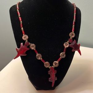 N15. Beaded necklace with animals.